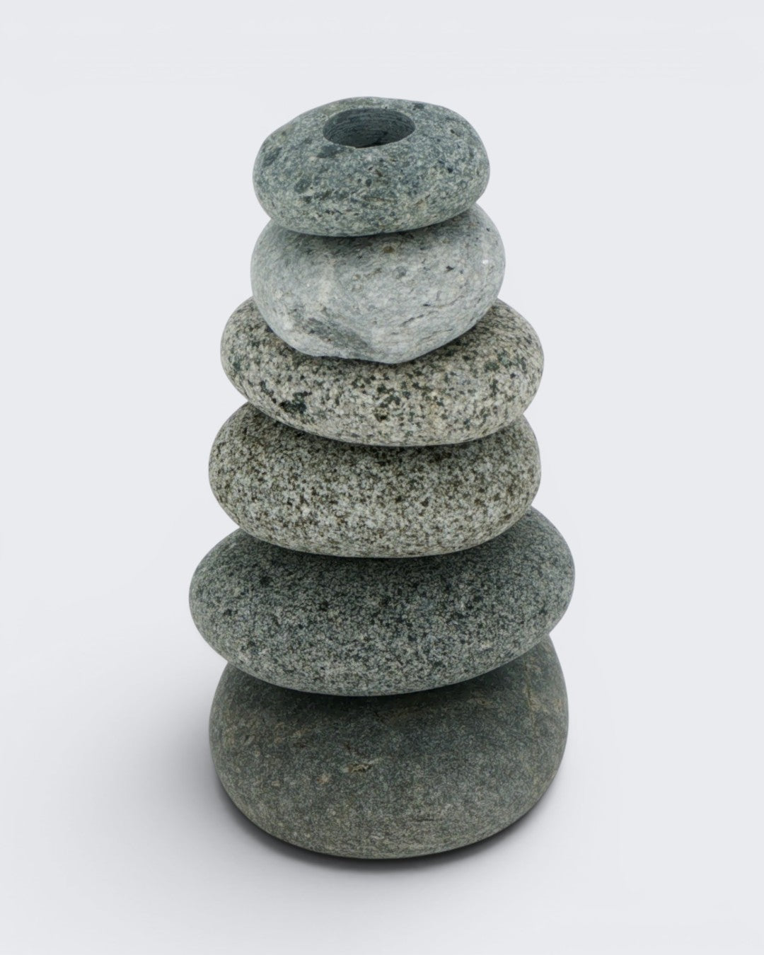 Handcrafted cairn vase with stacked beach stones, angled view showing round opening at top stone, 7 inch natural stone bud vase