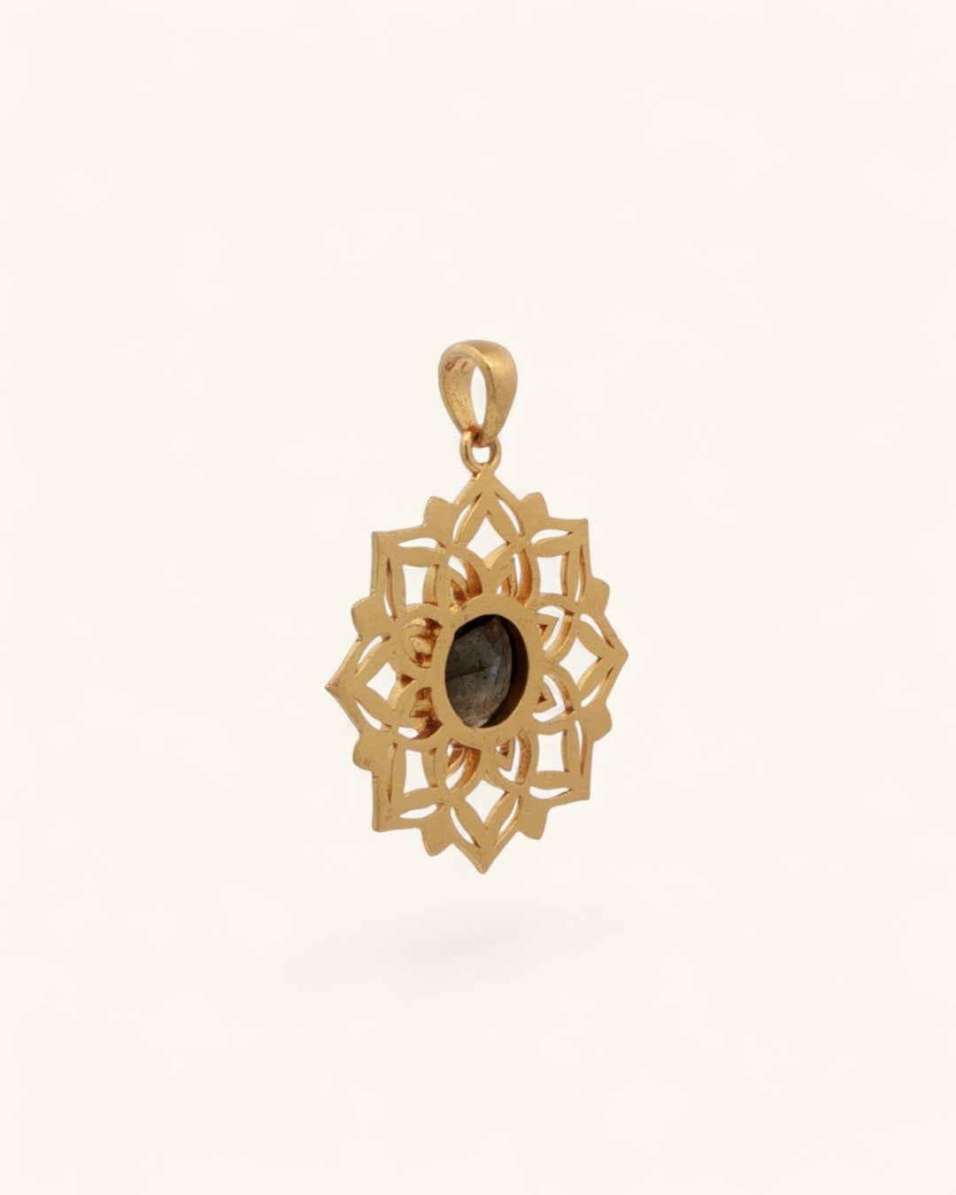 Back view of gold-plated lotus mandala pendant showing reverse side of labradorite stone and open bail loop