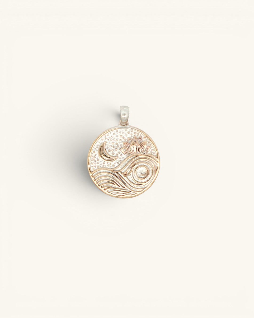 Round silver-plated bronze moon and wave lotus pendant, flat overhead view showing engraved celestial design