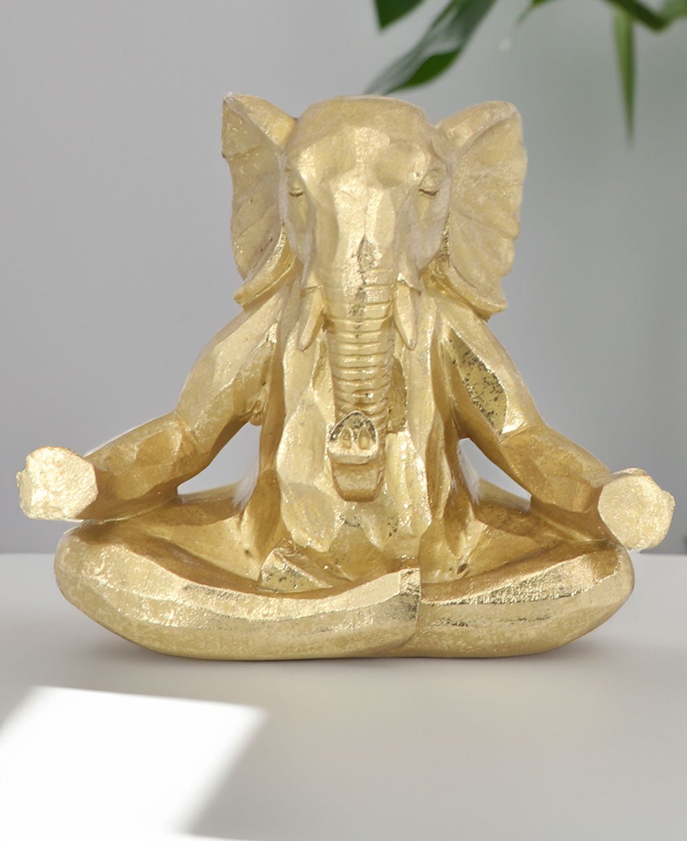Yoga meditating elephant statue