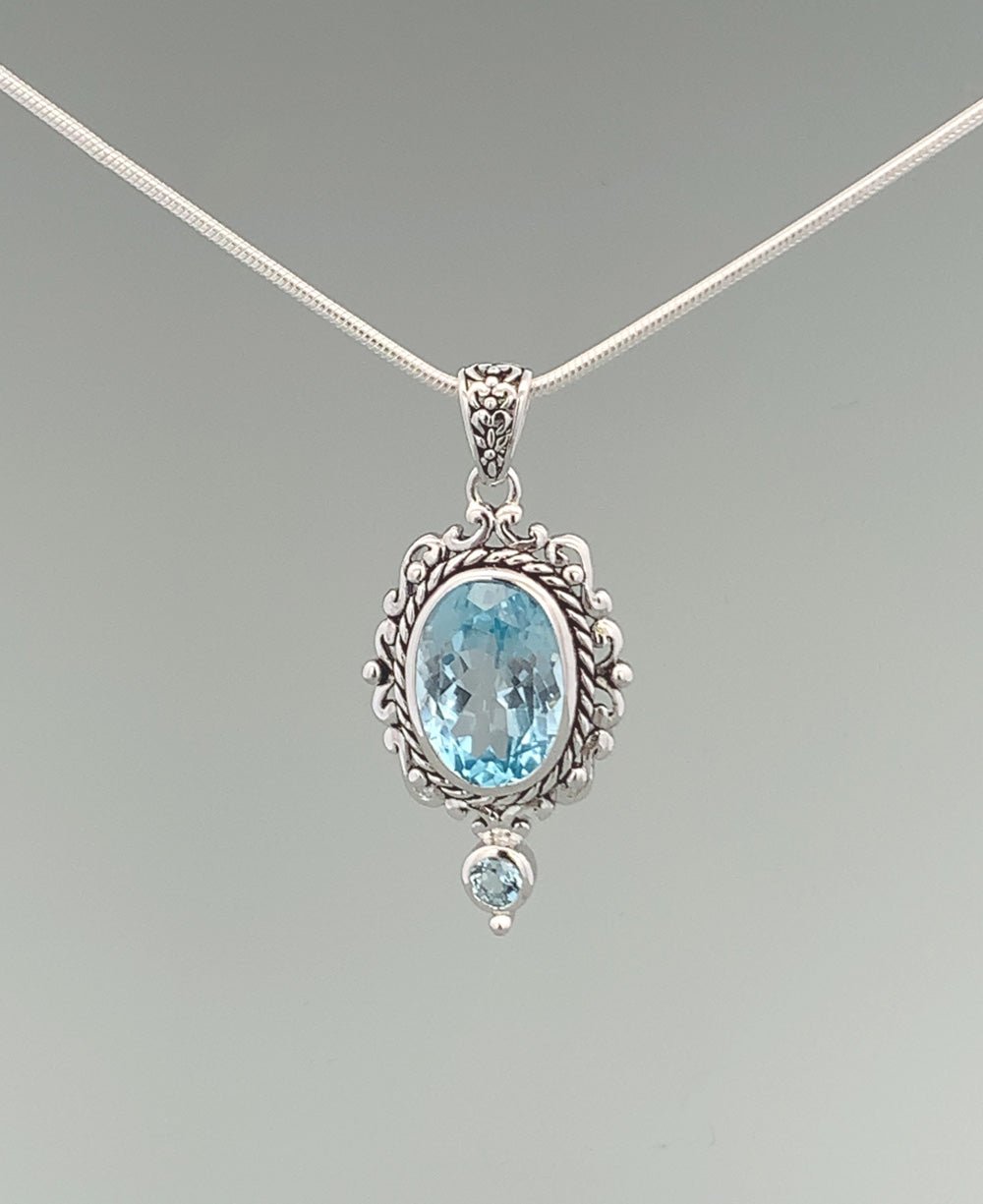 Sterling Silver Blue Topaz Pendant - Charms & Pendants