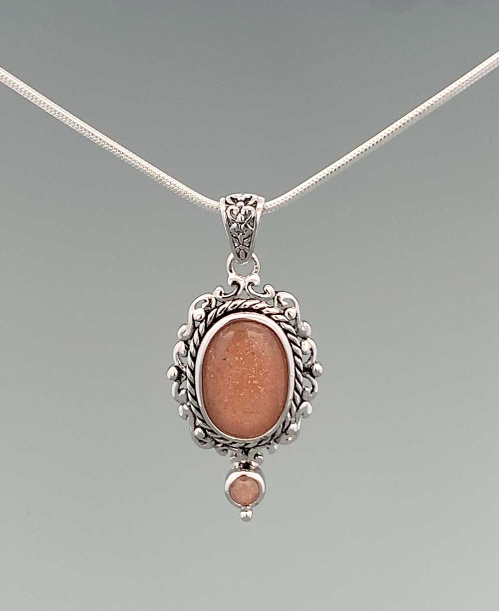 Sterling Silver Peach Moonstone Frame Pendant - Charms & Pendants