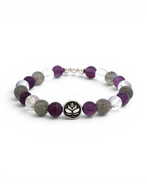 Amethyst, labradorite, and clear quartz lotus stretch bracelet angled front view with lotus charm centered on white background