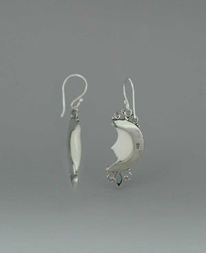 Bali - Crafted Sterling Silver Earrings with Carved Moon Face and Blue Topaz - Earrings
