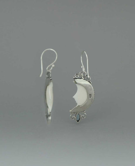 Bali - Crafted Sterling Silver Earrings with Carved Moon Face and Blue Topaz - Earrings