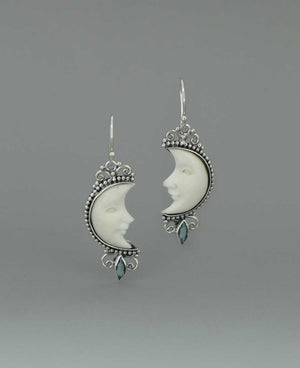 Bali - Crafted Sterling Silver Earrings with Carved Moon Face and Blue Topaz - Earrings