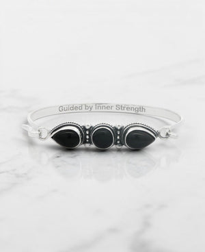 Black Onyx Three - Stone Bracelet — Guided by Inner Strength Engraved Cuff - Jewelry