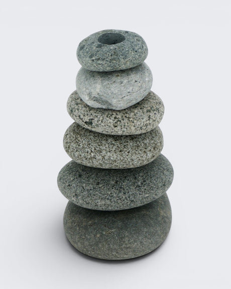 Handcrafted cairn vase with stacked beach stones, angled view showing round opening at top stone, 7 inch natural stone bud vase