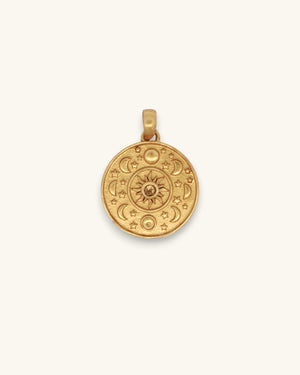 Celestial Sun and Moon Citrine Pendant in gold-plated brass, front view showing engraved sun, moon phases, and stars