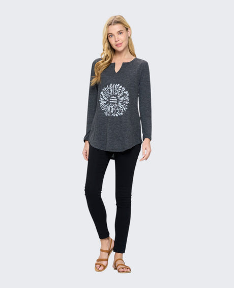 Women's charcoal grey long sleeve tunic top with floral wreath graphic, full length front view styled with black pants and sandals
