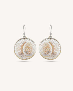 Crescent moon disc earrings in silver-plated bronze, front view of pair against white background showing textured dot detailing