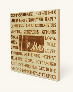 I Am affirmation laser-engraved wood wall plaque at an angle on white background showing frame depth and thickness