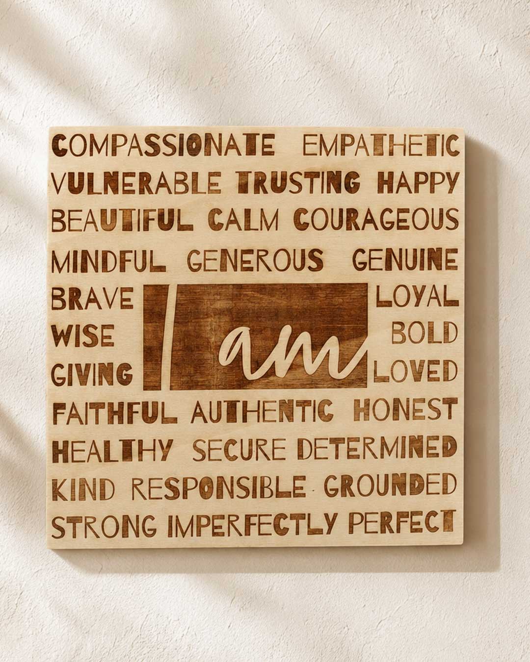 I Am laser-engraved wood wall hanging front view showing all affirmation words on a light birch wood panel