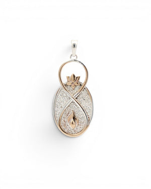 Infinite Lotus & Flame Pendant in three-quarter view on white background, highlighting the raised gold lotus and flame details
