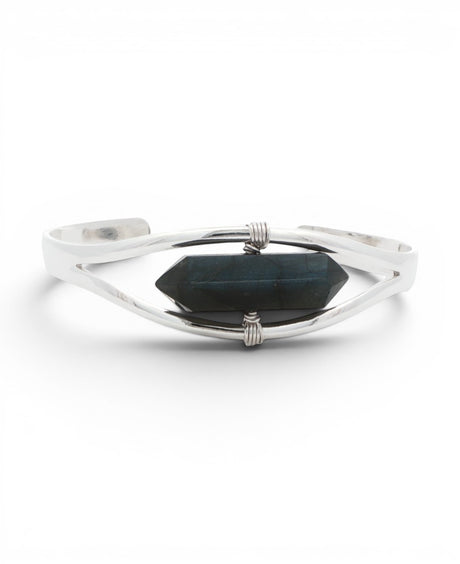 Labradorite crystal point set in a silver cuff bracelet, front view with wire-wrapped bindings