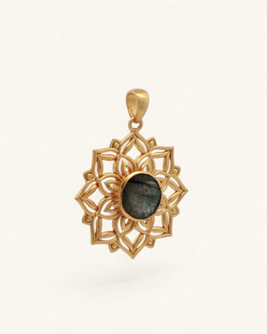 Left-angle view of gold lotus mandala pendant with labradorite stone highlighting the layered cutwork petals