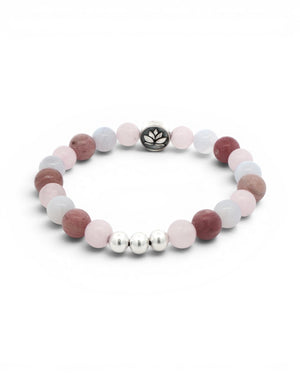 Love Connection Lotus Bracelet on white background, angled three-quarter view showing bead depth, lotus charm at top and silver spacers at base