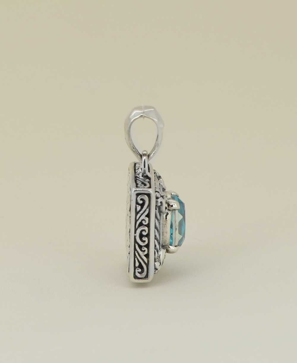 Sterling Silver Framed Blue Topaz Pendant - Charms & Pendants