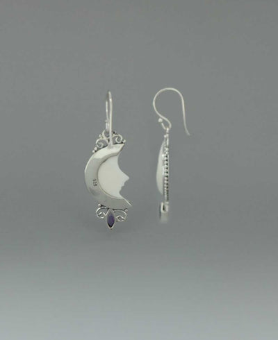 Bali-Crafted Sterling Silver Earrings with Carved Moon Face and Amethyst - Earrings