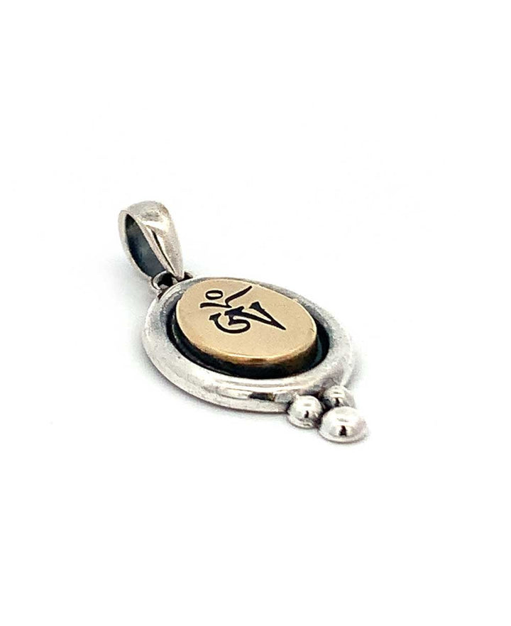 Sterling Silver And Brass Tibetan Om Pendant - Charms & Pendants